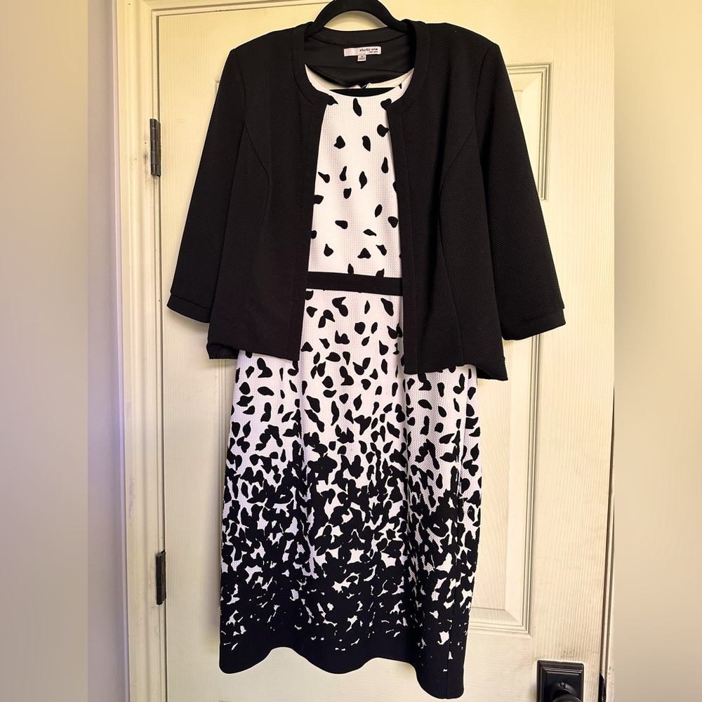 White dress with falling petals and removable jacket